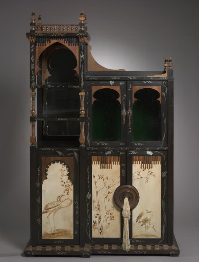 Bugatti again. A cabinet that argues with you. How do you open it? You don't, it opens you.