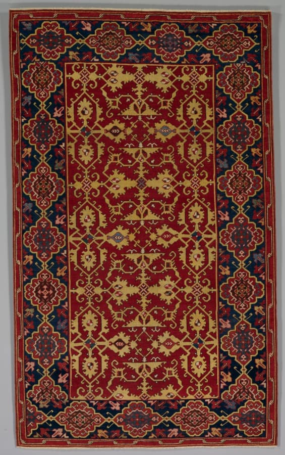 A carpet is a layout: border, field, medallion. A magazine spread from 1600.