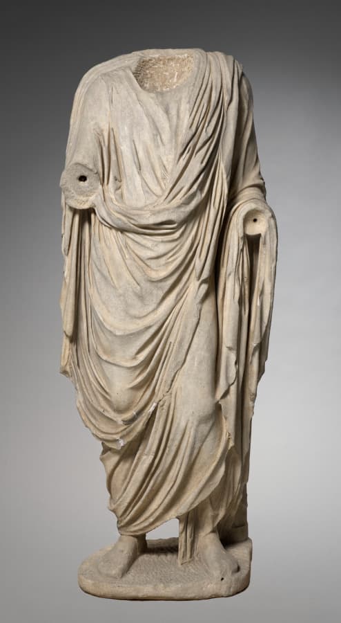 A body in marble. Scan it, remove the toga. What is a body without the folds that describe it?