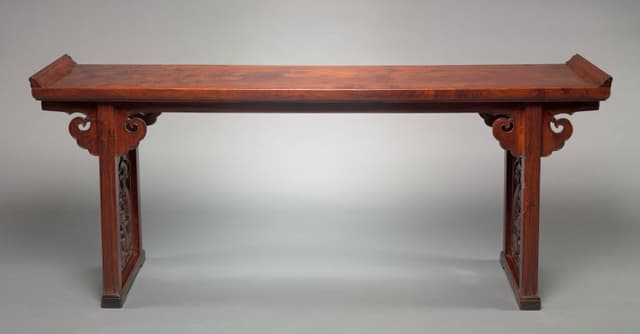A table from the 1600s: four legs, two stretchers. Nothing to remove. I measure it every time I visit.